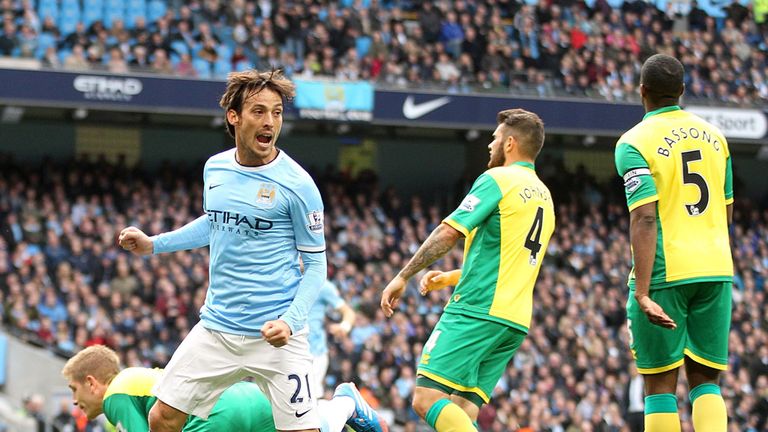 David Silva celebrates his first half goal