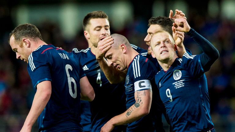 Scott Brown: Celebrates his winner with Scotland team-mates