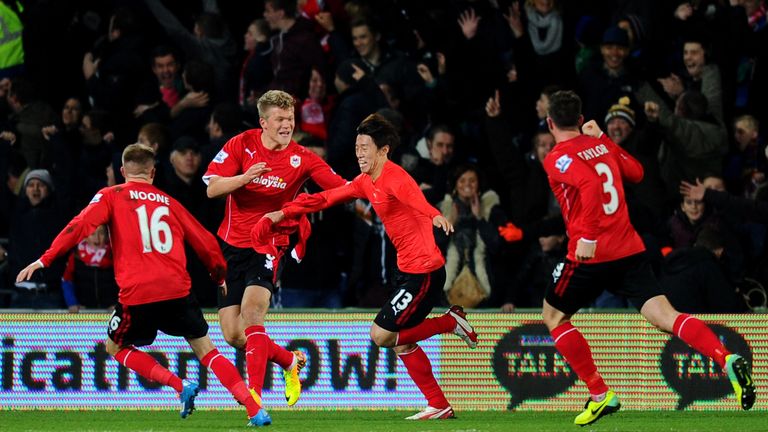 Kim Bo-kyung: Celebrates with team-mates after scoring equaliser