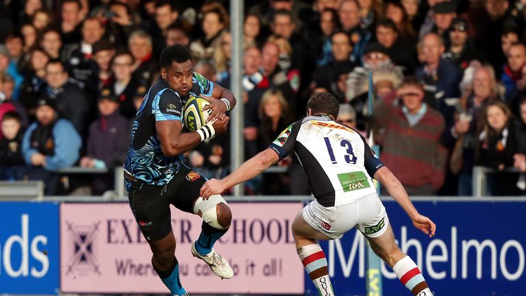 Exeter Chiefs' Sireliu Naqelevuki evades Harlequins' Tim Molenaar