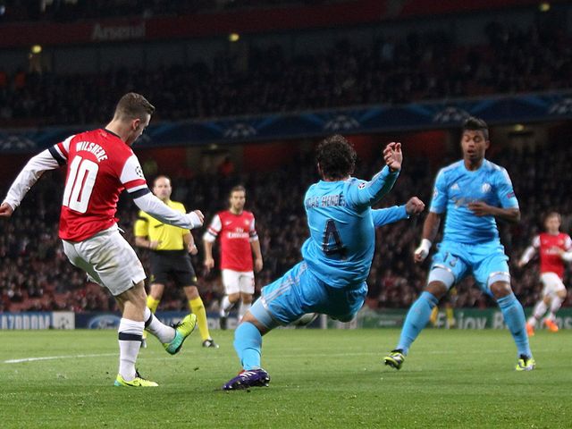 Jack Wilshere scores his first of two goals against Marseille