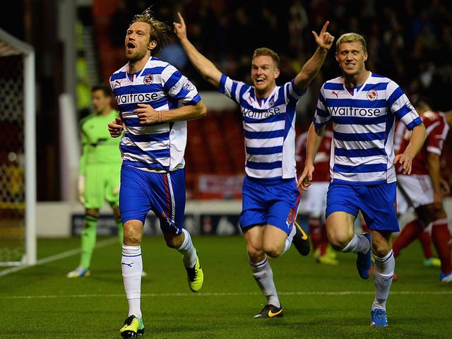 Kaspars Gorkss celebrates his goal for Reading