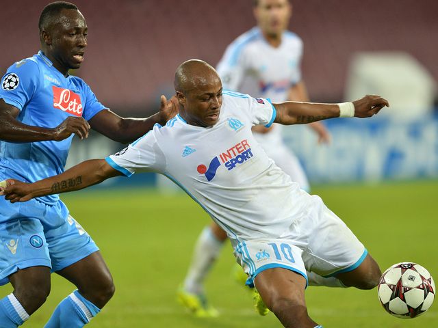 Andre Ayew is put under pressure.