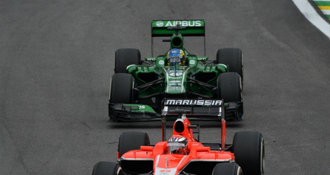 Big boost: Marussia's Jules Bianchi leads Caterham's Charles Pic in Brazil