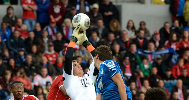 Bayern Munich keeper Manuel Neuer catches under pressure