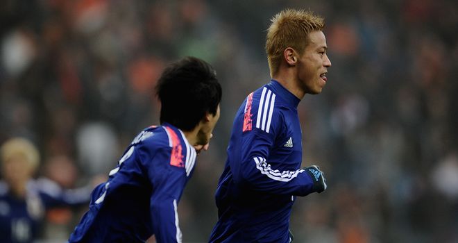 Keisuke Honda: Celebrates equaliser for Japan against Holland