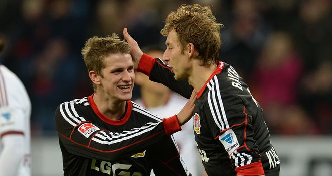Stefan Kiessling and Lars Bender celebrate for the hosts