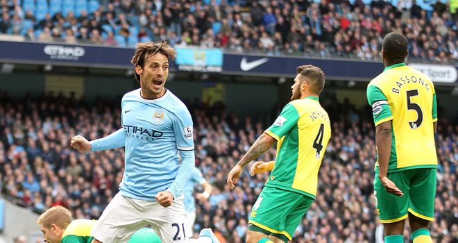 David Silva celebrates his first half goal