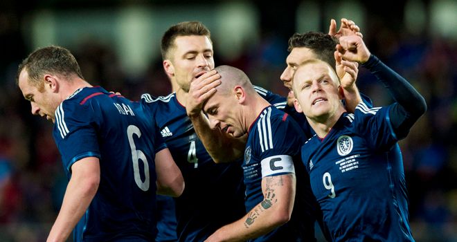 Scott Brown: Celebrates his winner with Scotland team-mates