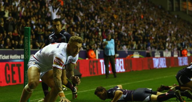 Josh Charnley scores his second try against France at the DW Stadium