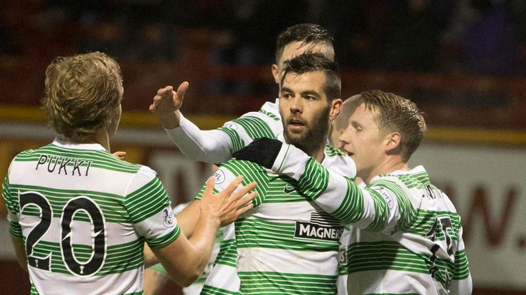 Kris Commons (right): Celebrates his first goal in the 5-0 win at Motherwell