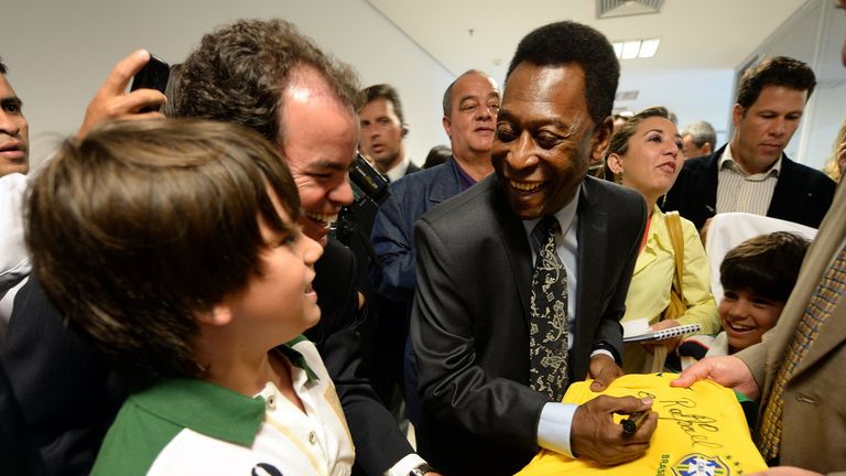 Pele at the inauguration of the 'Brazil, one country, one world' exhibition in Brasilia
