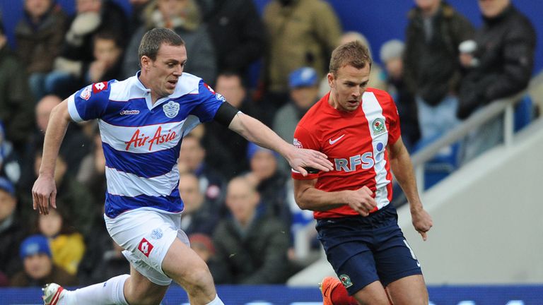 Richard Dunne challenges Jordan Rhodes for the ball