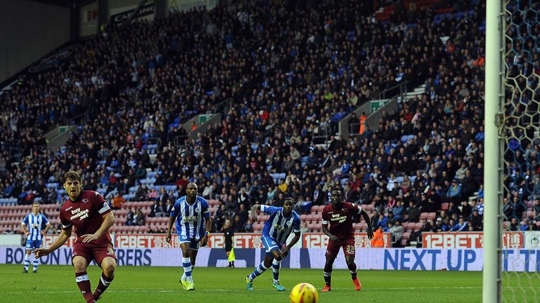 Chris Martin scores Derby's third from the penalty spot