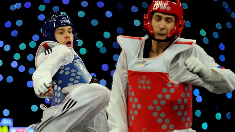 Cook in action agianst Russia's Albert Gaun in the Men's 80kg semi final