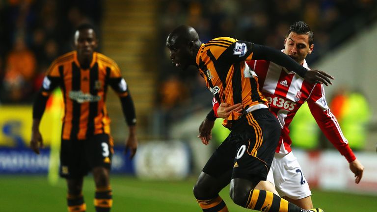 Yannick Sagbo: The Hull striker tangles with Geoff Cameron in the 0-0 draw