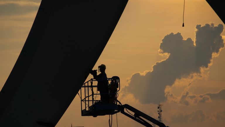 A man works at the Arena da Amazonia stadium, Manaus