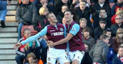 Jack Collison (l) and Andy Carroll: West Ham defender delighted to see striker return