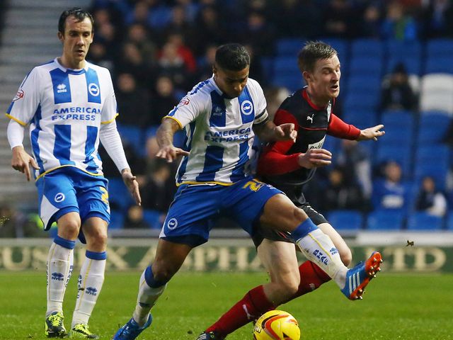 Liam Bridcutt shows his strength against Paul Dixon