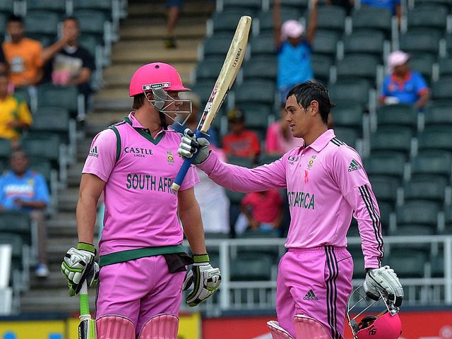 Quinton De Kock celebrates reaching his century.