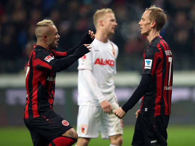 Jan Rosenthal (r) is congratulated on his equaliser by Stephan Schroeck