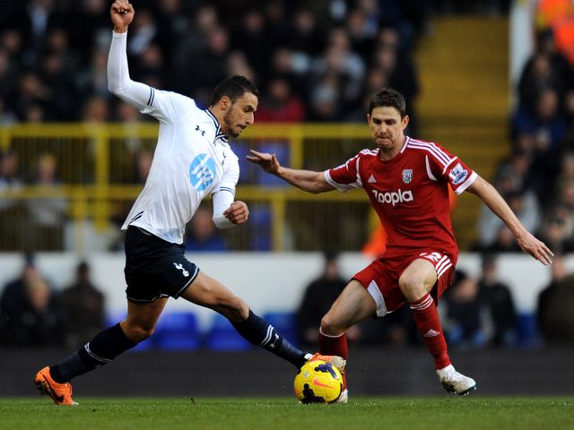 Nacer Chadli tries to skip past Zoltan Gera