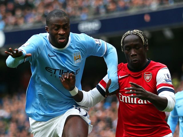 Yaya Toure and Bacary Sagna in action