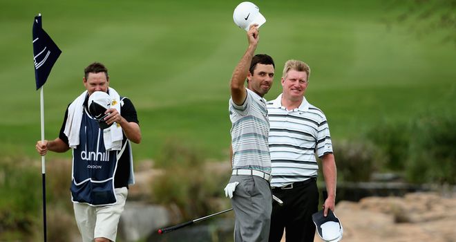 Charl Schwartzel acknowledges the galleries after sealing victory at Leopard Creek