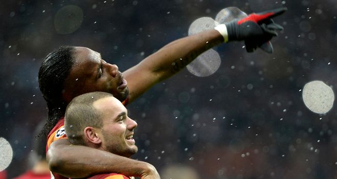 Didier Drogba: Celebrates with Wesley Sneijder after Gala's 1-0 win over Juventus on Wednesday
