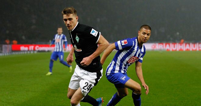 Nils Petersen and Marcel Ndjeng watch the ball