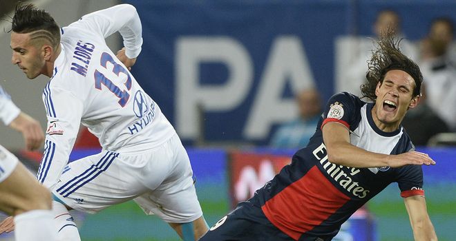 Edinson Cavani takes a tumble.