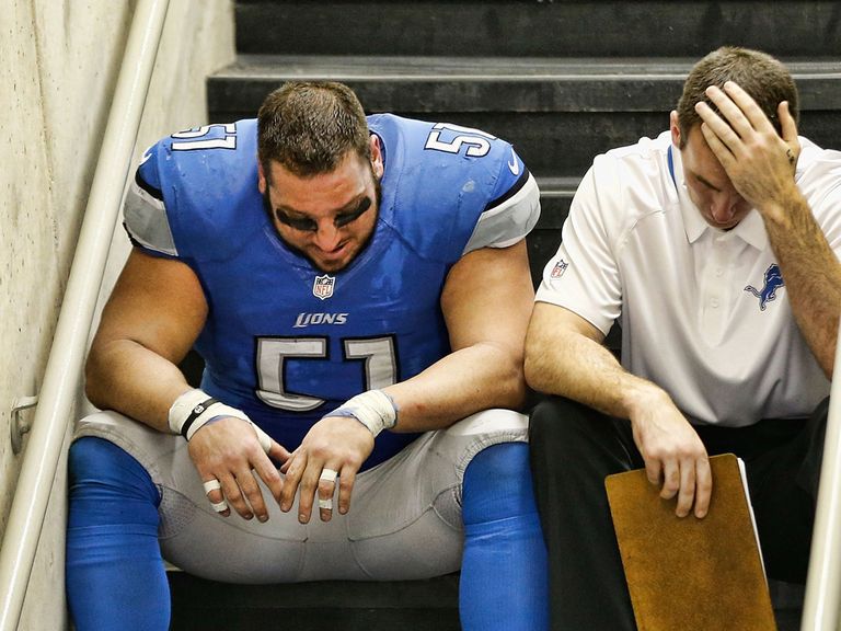A dejected Dominic Raiola after Detroit's elimination
