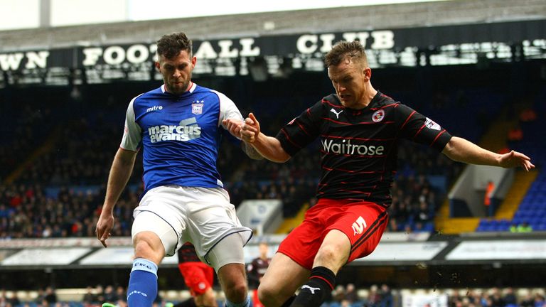 Daryl Murphy (left) and Alex Pearce: Battle for the ball at Portman Road