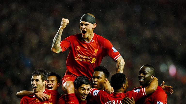 Liverpool celebrate during their 4-0 victory over Everton in 2014