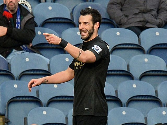 Alvaro Negredo celebrates his opener for City
