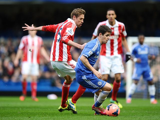 Oscar turns away from Peter Crouch