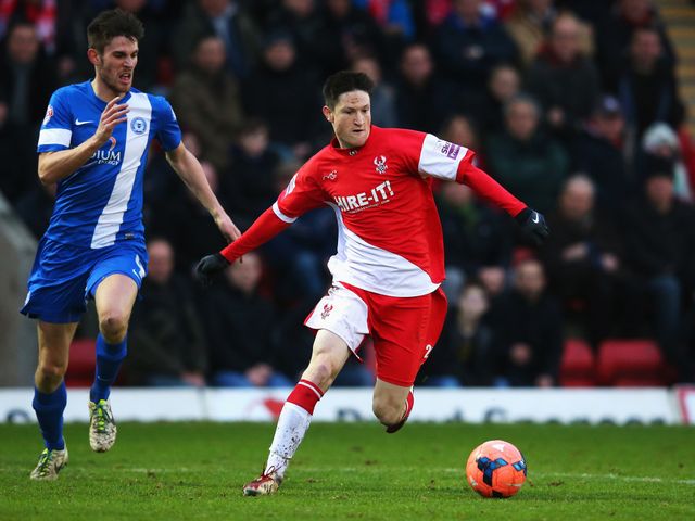 Joe Lolley of Kidderminster Harriers in possession