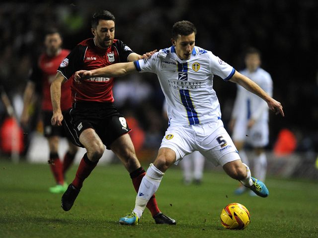 Cole Skuse and Jason Pearce battle for the ball