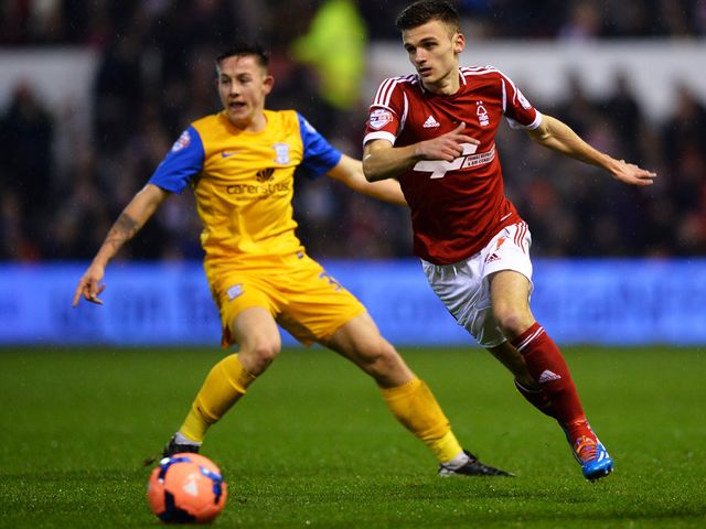 Jamie Paterson is watched by Josh Brownhill