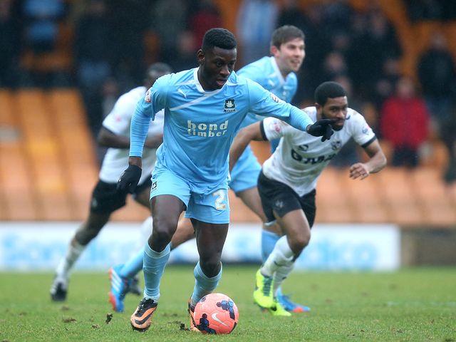 Temitope Obadeyi of Plymouth Argyle controls the ball