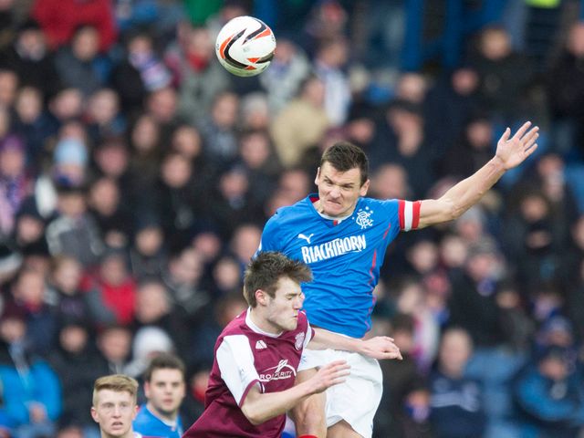 Lee McCulloch jumps high for a header