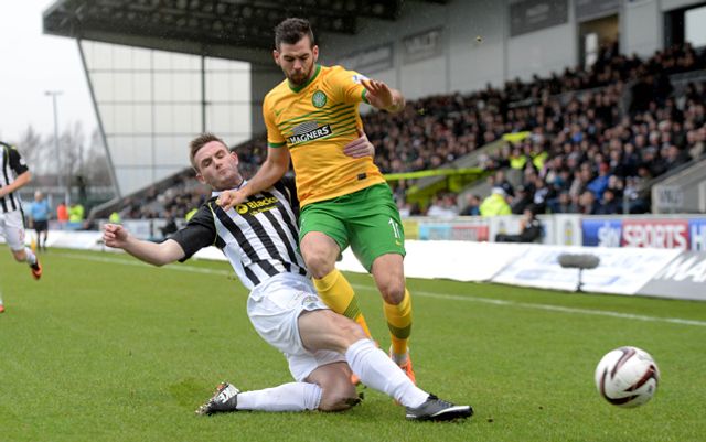 St Mirren's Jason Naismith left tackles Joe Ledley