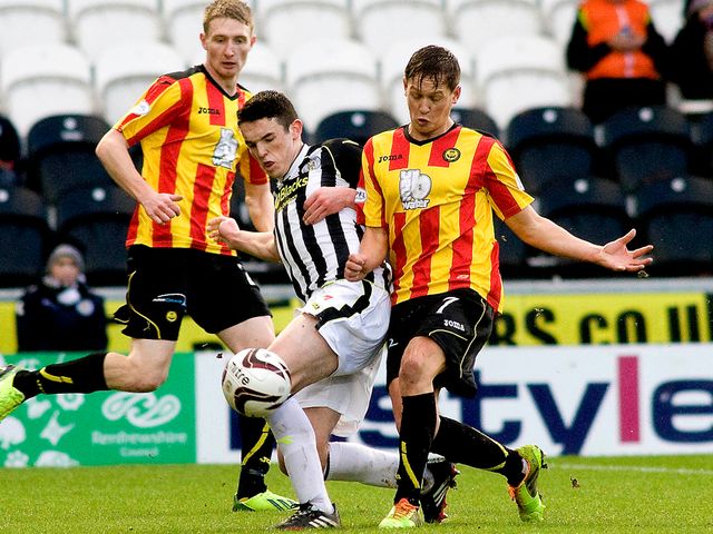 John McGinn challenges James Craigen
