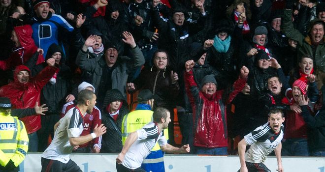 Peter Pawlett celebrates his last-gasp winner at Tannadice