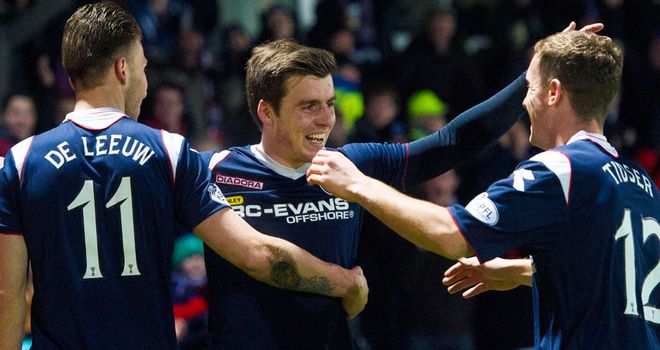 Graham Carey celebrates after bagging a late winner
