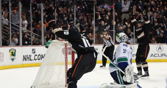 Corey Perry celebrates after scoring the game-winning goal in overtime