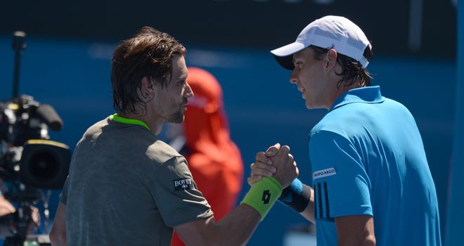 David Ferrer (left) shakes hands with Alejandro Gonzalez