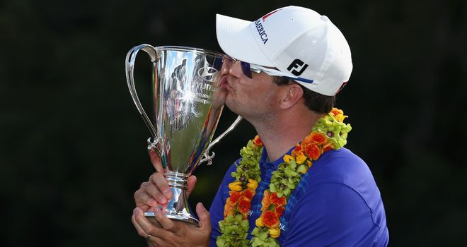Zach Johnson: Kisses the trophy after winning the Hyundai Tournament of Champions