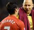 Brad Guzan and Luis Suarez shake hands after Anfield clash