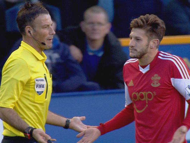 Mark Clattenburg and Adam Lallana